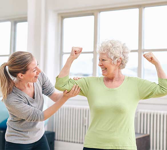 happy active adults going through physical therapy