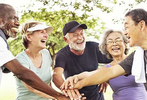 older adults smile after a group physical therapy class